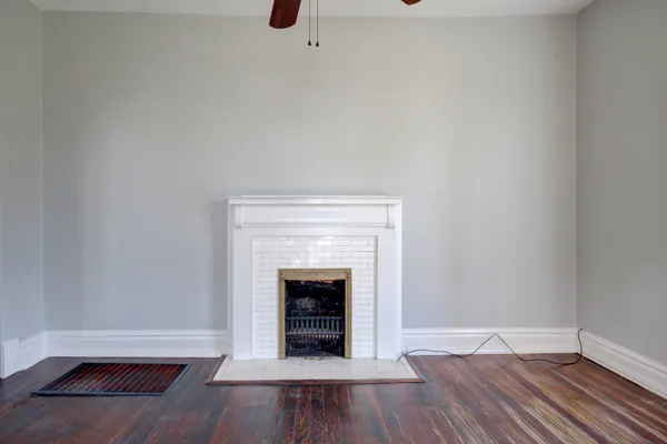 a kitchen with granite countertop a sink appliances and cabinets