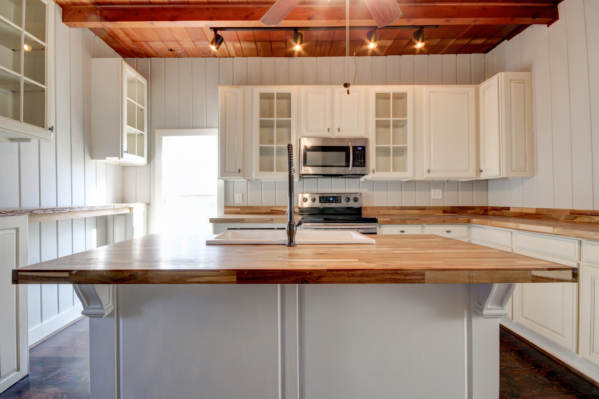 389 3rd Street Guthrie, KY 42234 - Photo 25 of 69 a kitchen with stainless steel appliances a sink a stove and a microwave