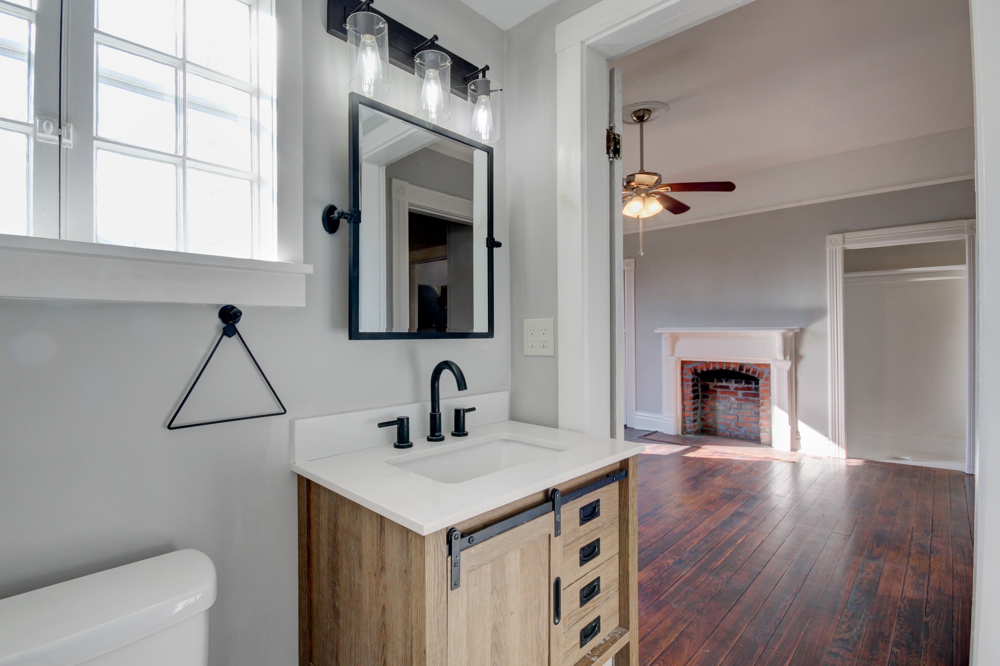 389 3rd Street Guthrie, KY 42234 - Photo 32 of 69 a bathroom with a sink and a mirror