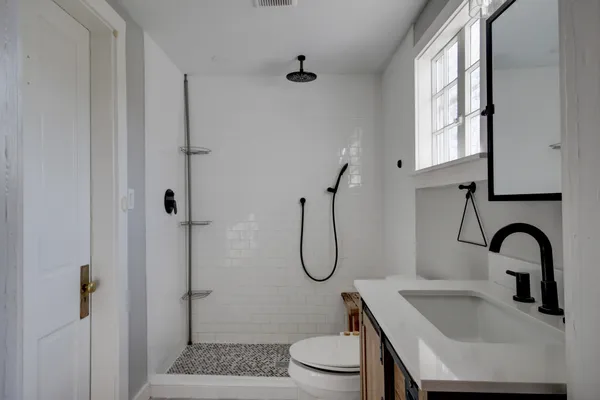 a view of an entryway with wooden floor and stairs