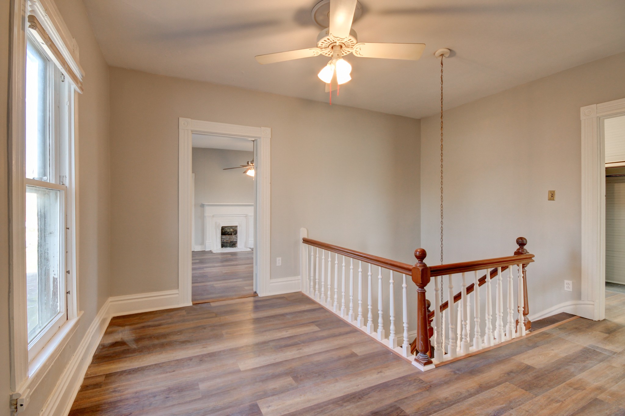 389 3rd Street Guthrie, KY 42234 - Photo 46 of 69 a view of a hallway with wooden floor and staircase