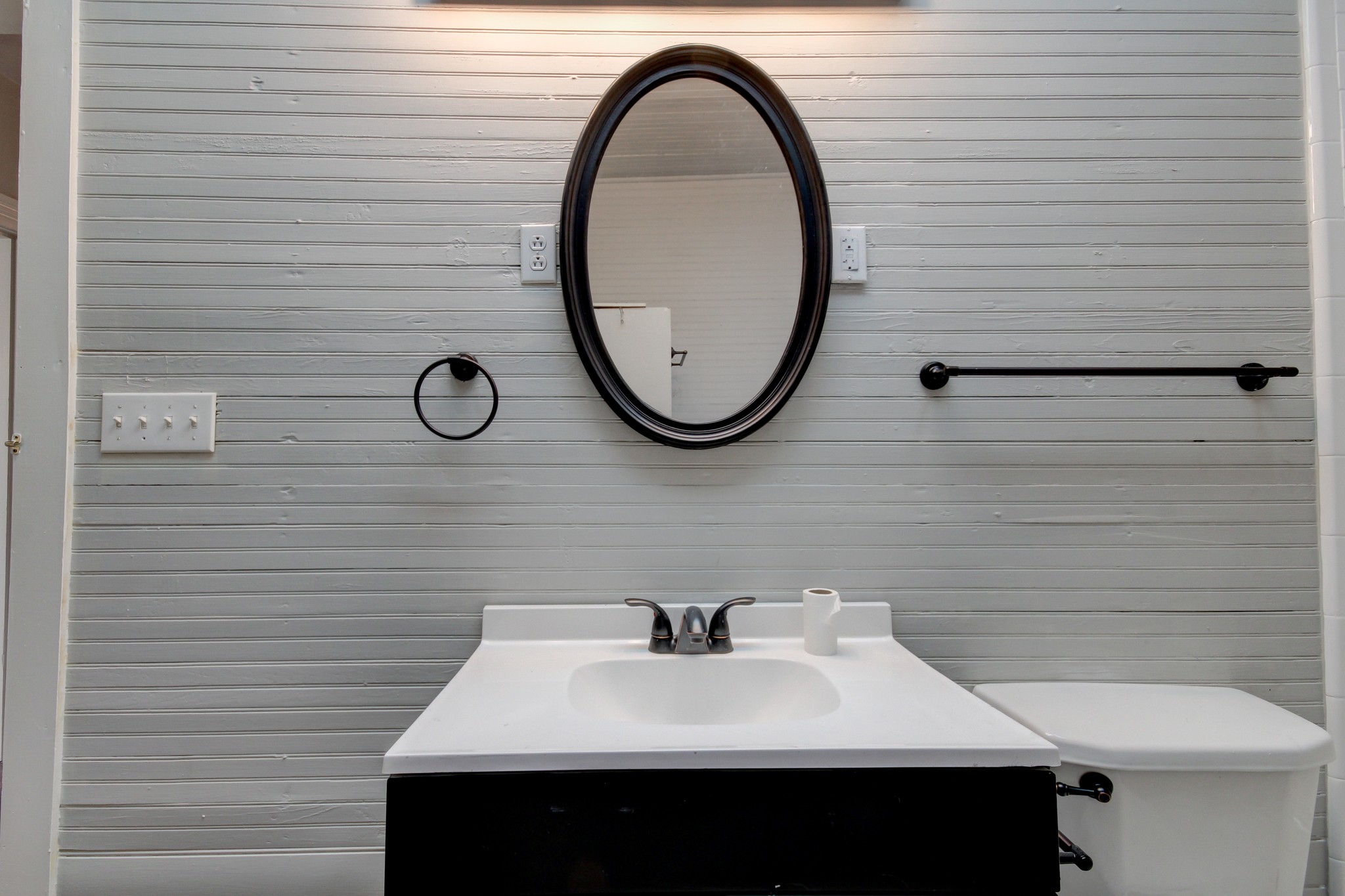 389 3rd Street Guthrie, KY 42234 - Photo 53 of 69 a bathroom with a sink and a mirror