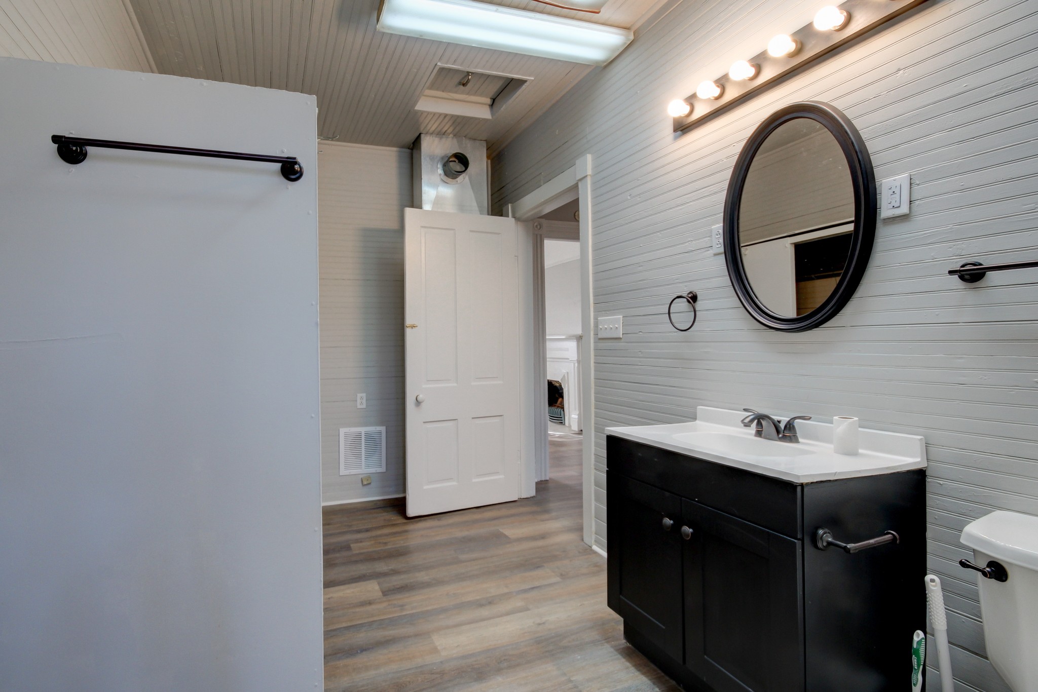 389 3rd Street Guthrie, KY 42234 - Photo 55 of 69 a bathroom with a sink and a mirror