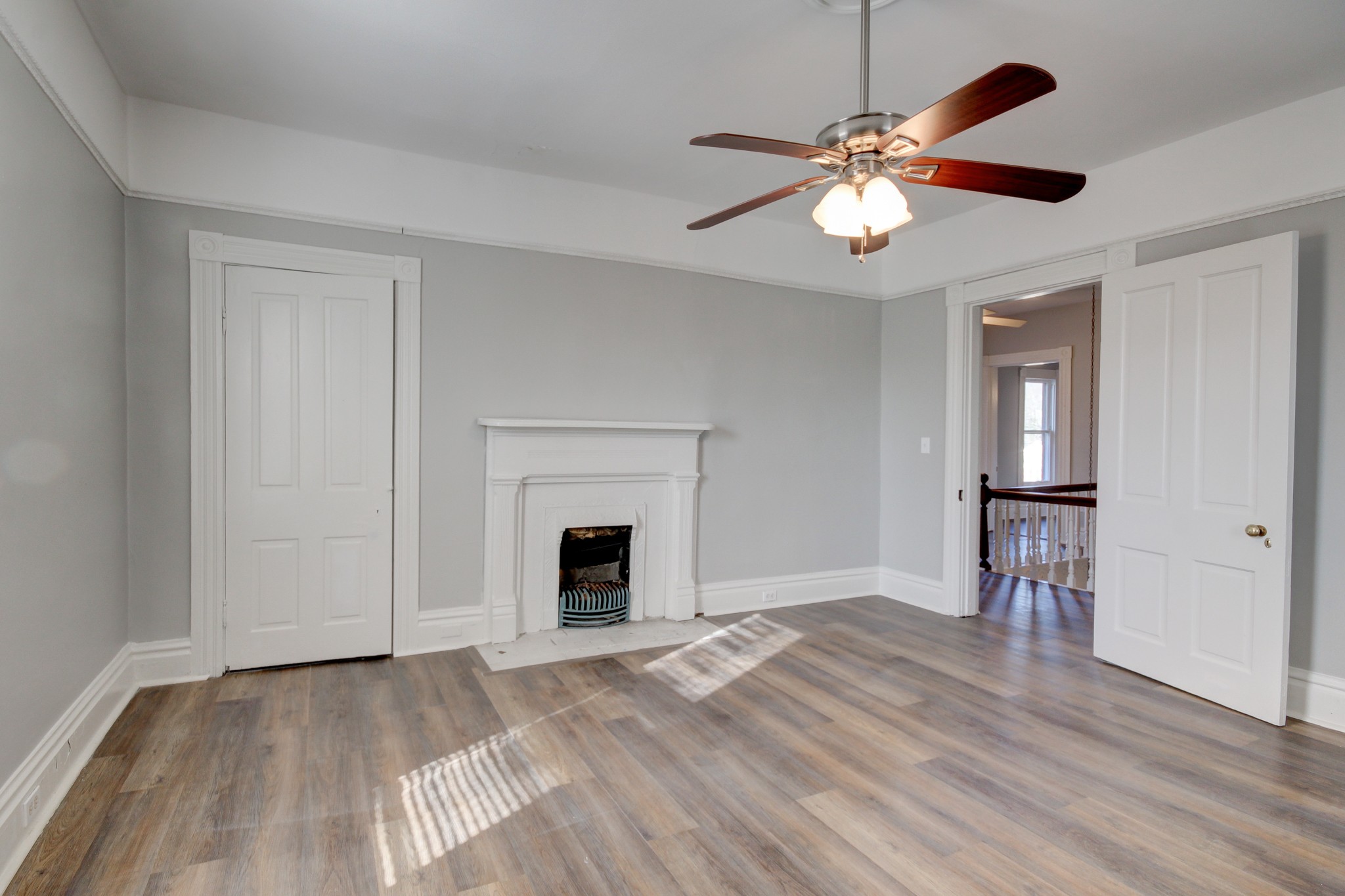 389 3rd Street Guthrie, KY 42234 - Photo 58 of 69 a view of an empty room with wooden floor and a window