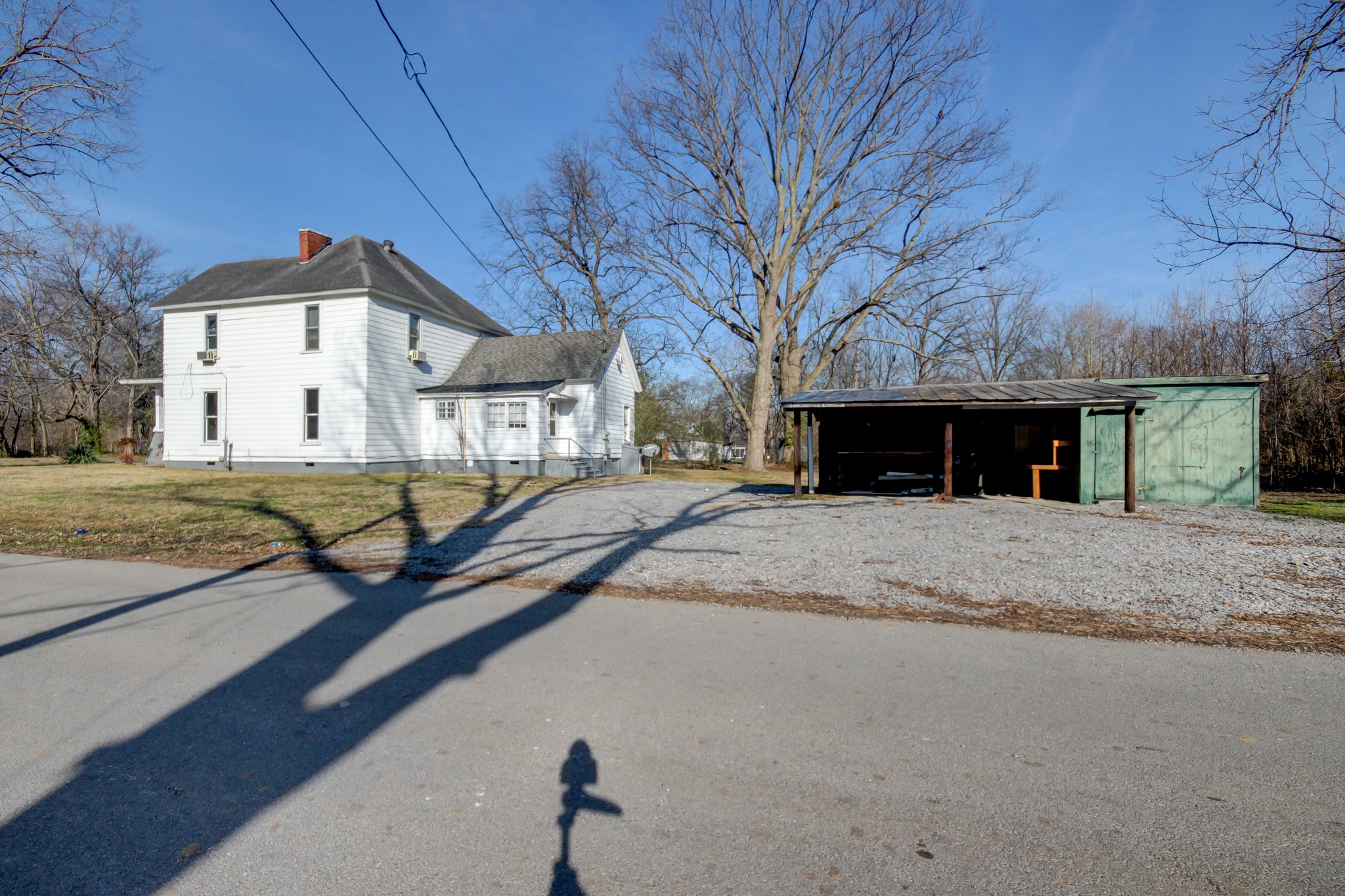 389 3rd Street Guthrie, KY 42234 - Photo 66 of 69 a view of a house with a yard and large tree
