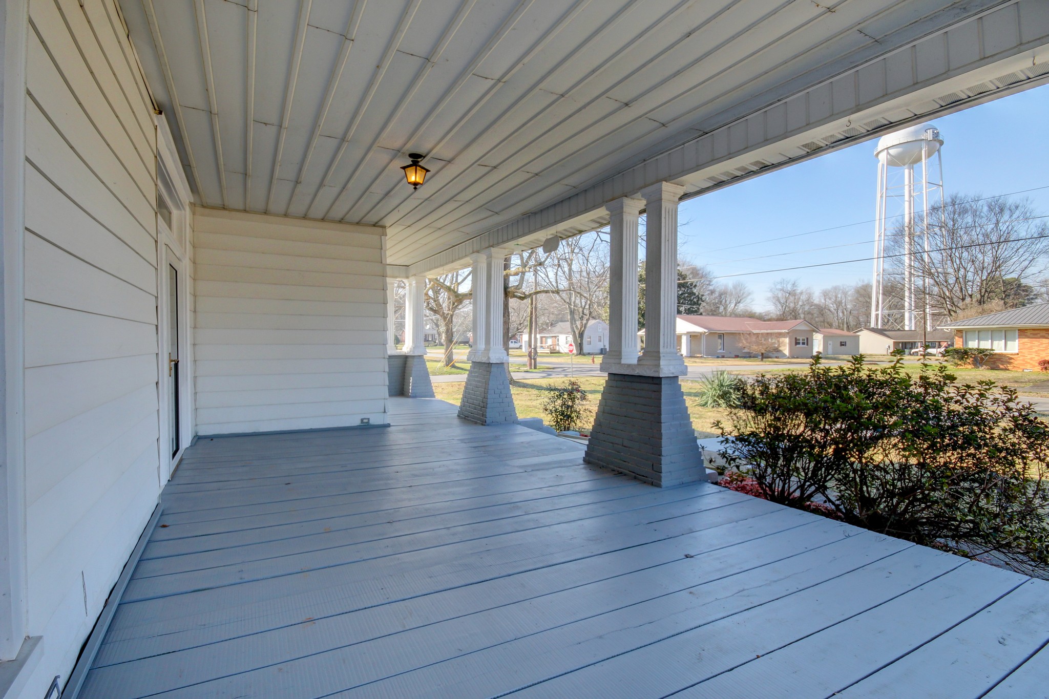 389 3rd Street Guthrie, KY 42234 - Photo 7 of 69 a view of empty room with wooden floor and fan
