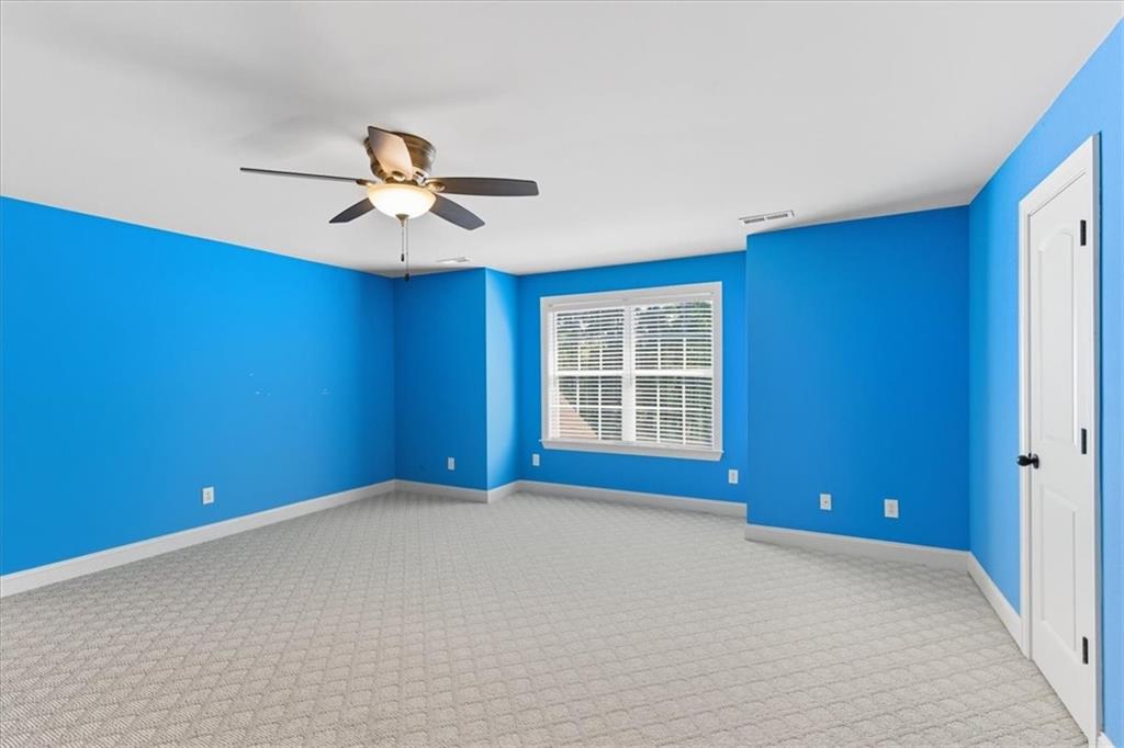 16 Nelson Boulevard Northwest Rome, GA 30165 - Photo 19 of 43 an empty room with windows and fan