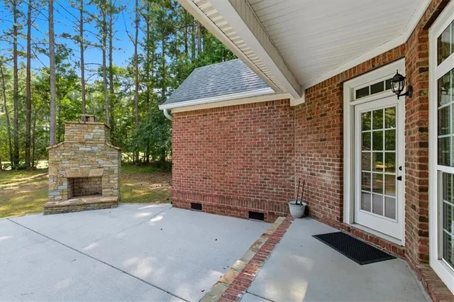 a brick house with a yard