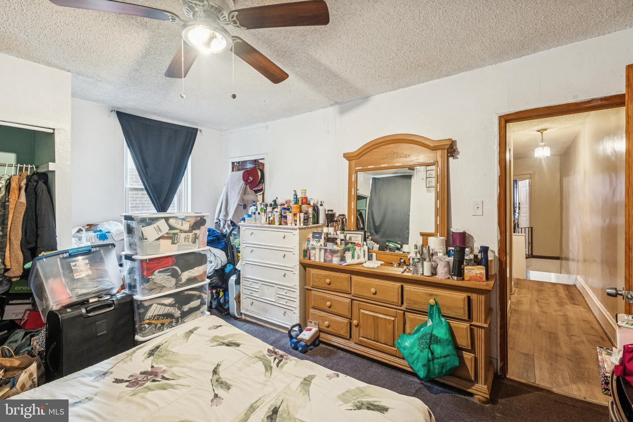 4725 Rosehill Street Philadelphia, PA 19120 - Photo 6 of 26 a living room with furniture and a flat screen tv