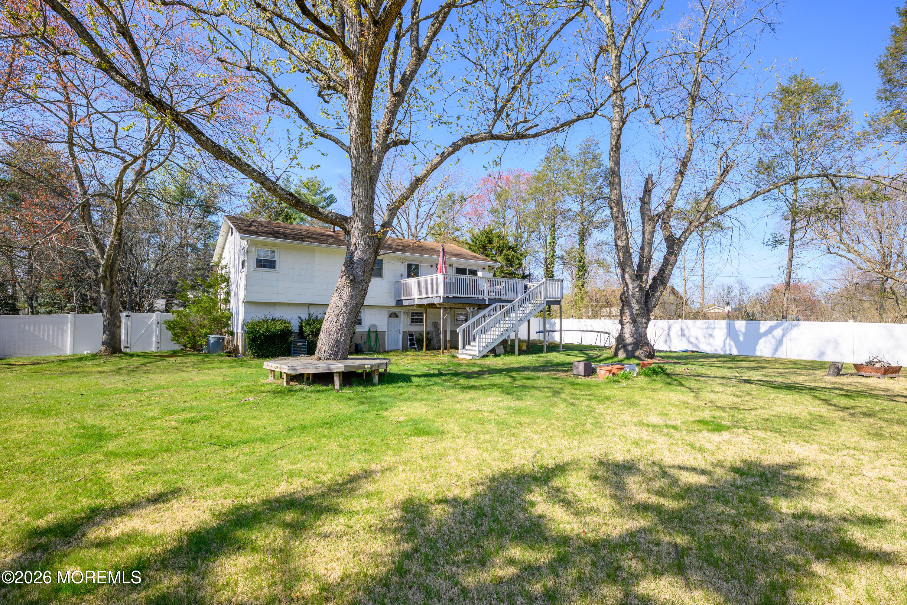 8 Holiday Road Manalapan, NJ 07726 - Photo 28 of 33 8_Holiday_Rd Back view yard & house