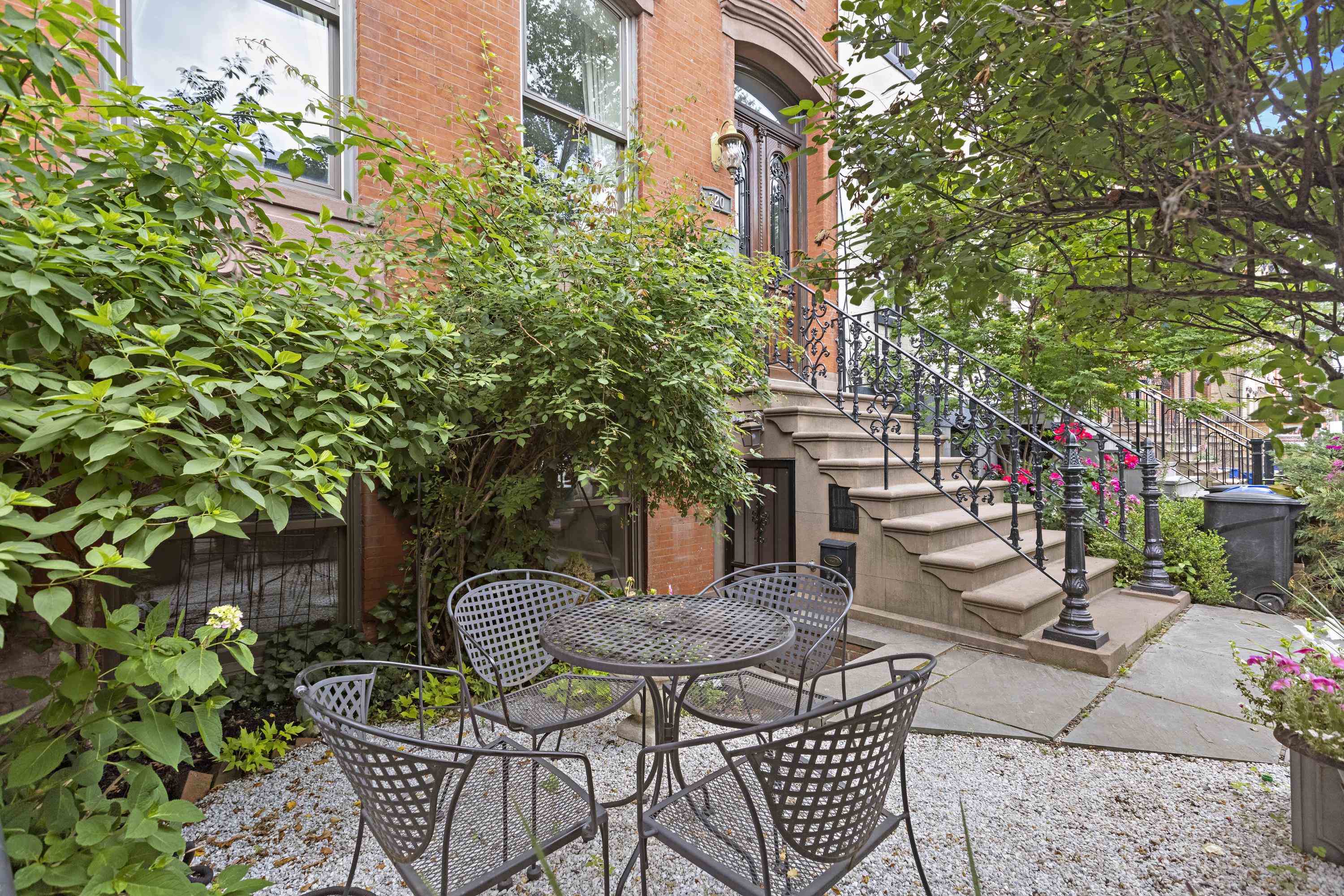 720 Bloomfield Street, Unit 1 Hoboken, NJ 07030 - Photo 12 of 13 a view of a chairs and table in backyard
