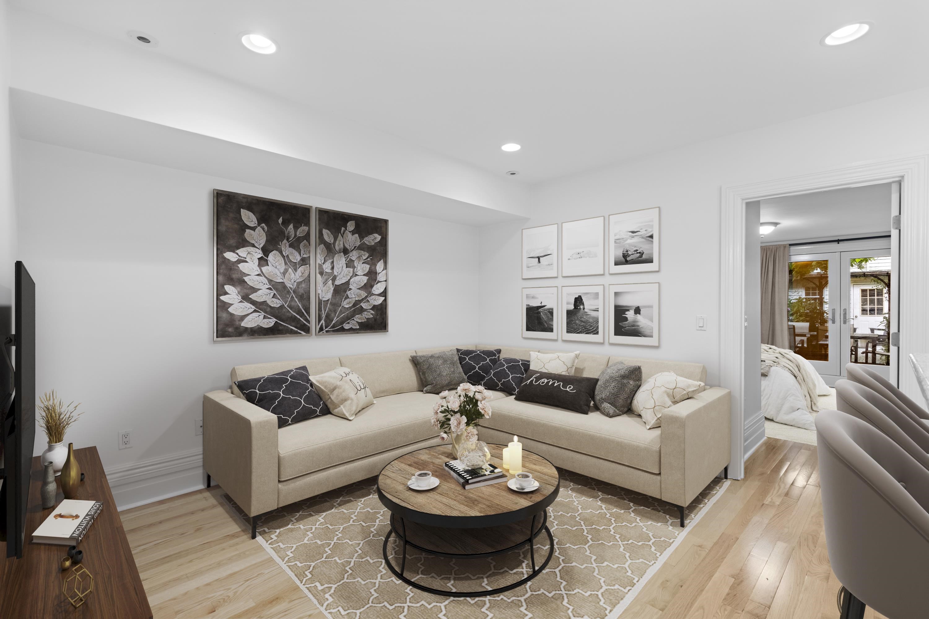 720 Bloomfield Street, Unit 1 Hoboken, NJ 07030 - Photo 2 of 13 a living room with furniture and a rug