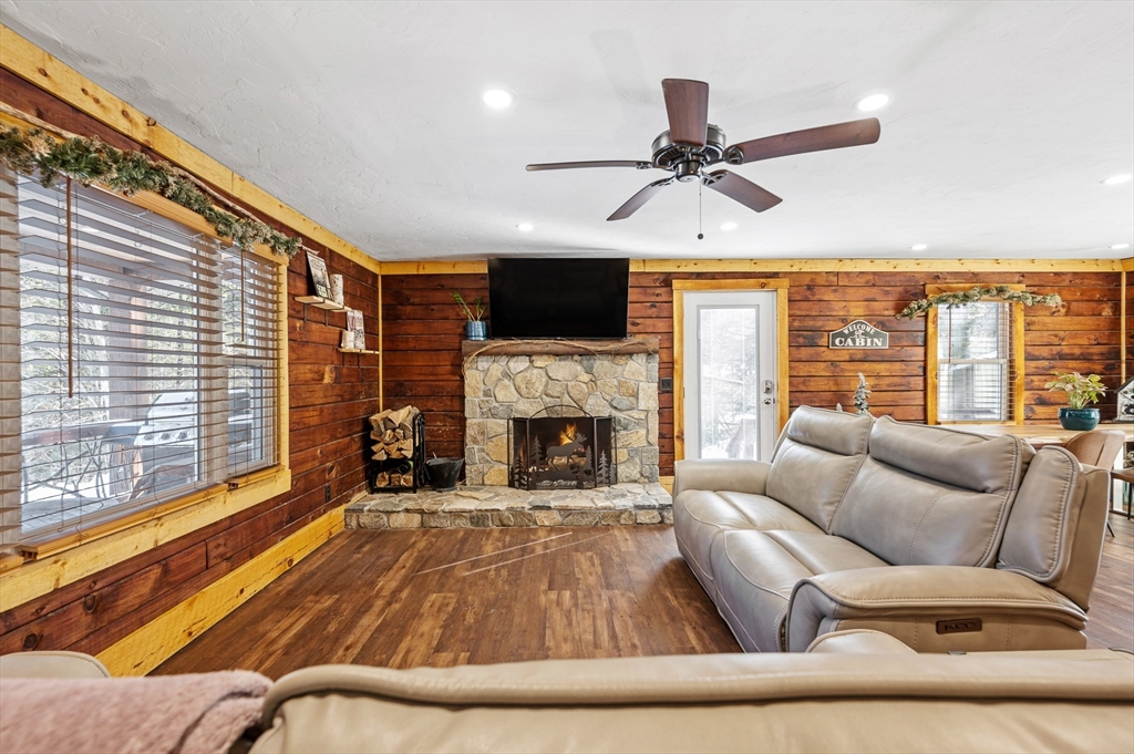 76 Wheeler Road Princeton, MA 01541 - Photo 2 of 42 a living room with furniture fireplace and flat screen tv