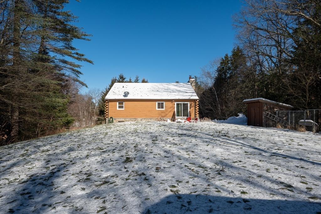 76 Wheeler Road Princeton, MA 01541 - Photo 34 of 42 a front view of a house with a yard