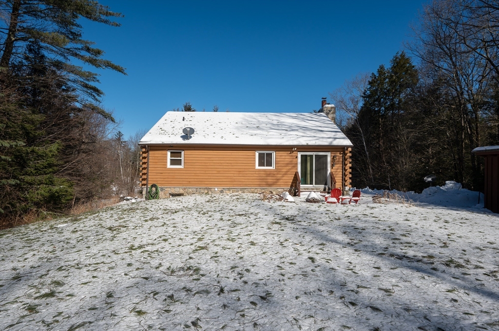 76 Wheeler Road Princeton, MA 01541 - Photo 35 of 42 a front view of a house with garden