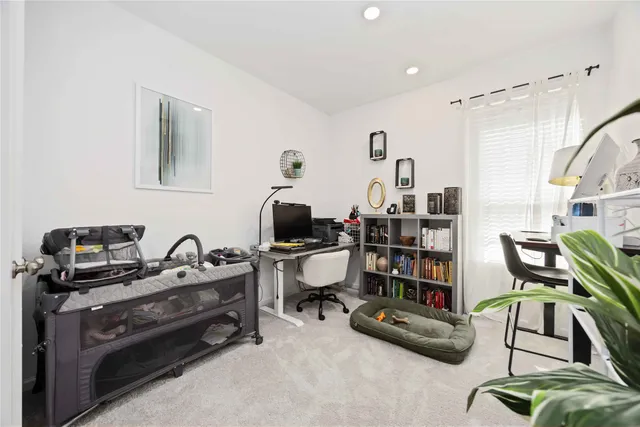 a view of a workspace with furniture