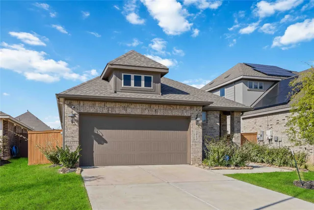 a front view of house with yard