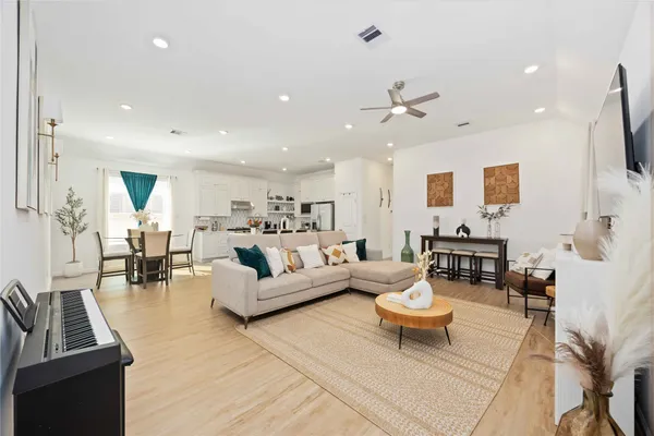 a living room with furniture or outdoor view and a fireplace