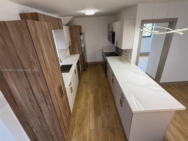 a view of a living room washer and dryer