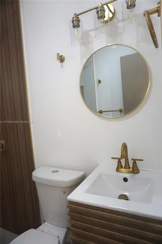 a bathroom with a sink and a toilet