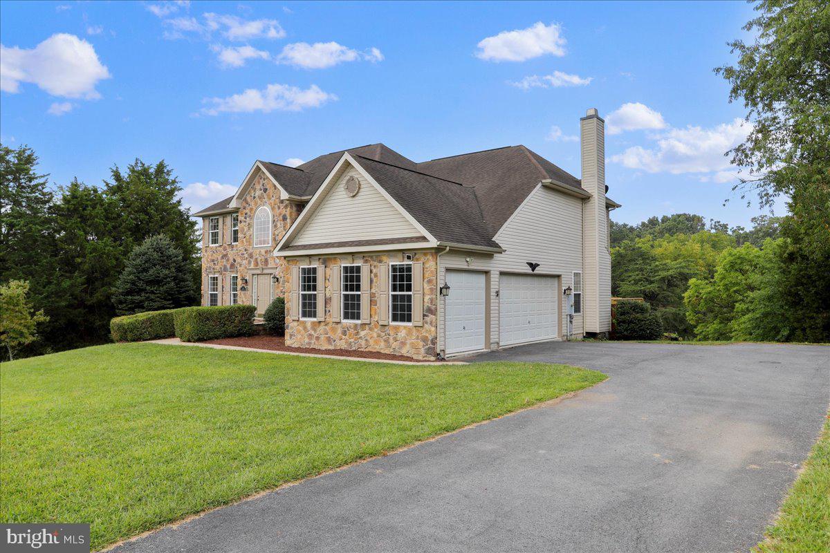 154 Triumphant Way Falling Waters, WV 25419 - Photo 2 of 60 3 car garage