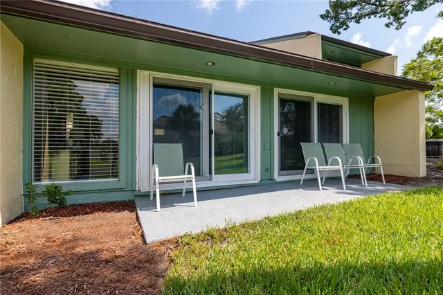 a house view with a outdoor seating space
