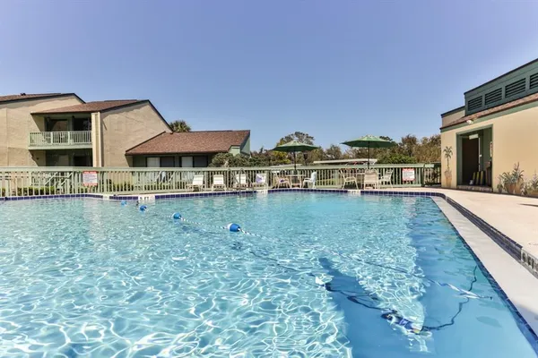 a view of a house with swimming pool