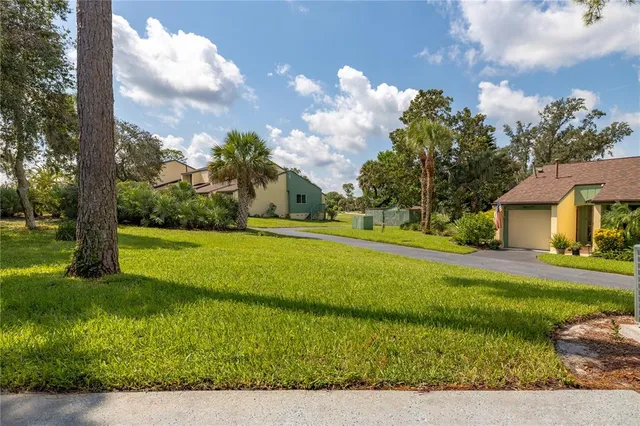a view of a house with a big yard
