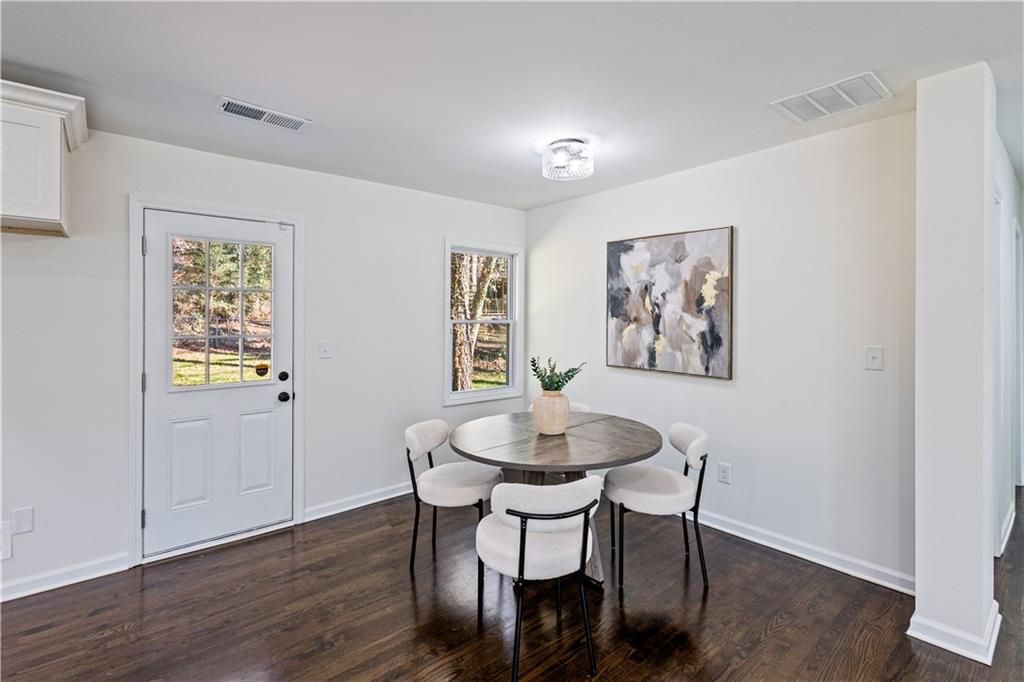 3252 Pinehill Drive Decatur, GA 30032 - Photo 11 of 26 a dining room with furniture and wooden floor