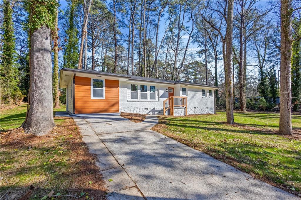 3252 Pinehill Drive Decatur, GA 30032 - Photo 2 of 26 a view of a house with backyard and sitting area