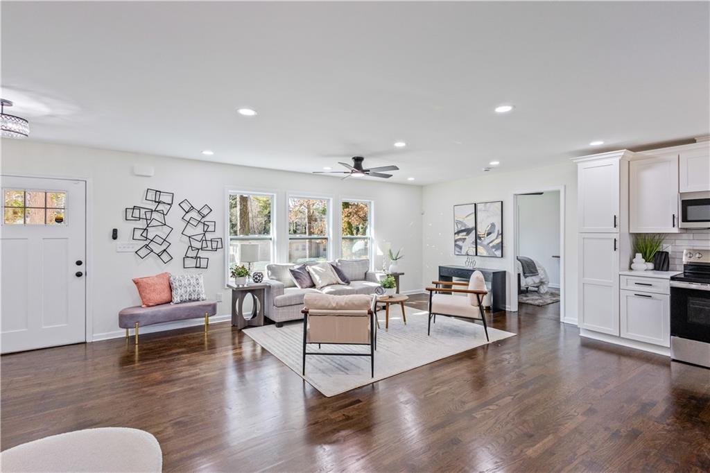 3252 Pinehill Drive Decatur, GA 30032 - Photo 5 of 26 a living room with furniture or wooden floor and a large window