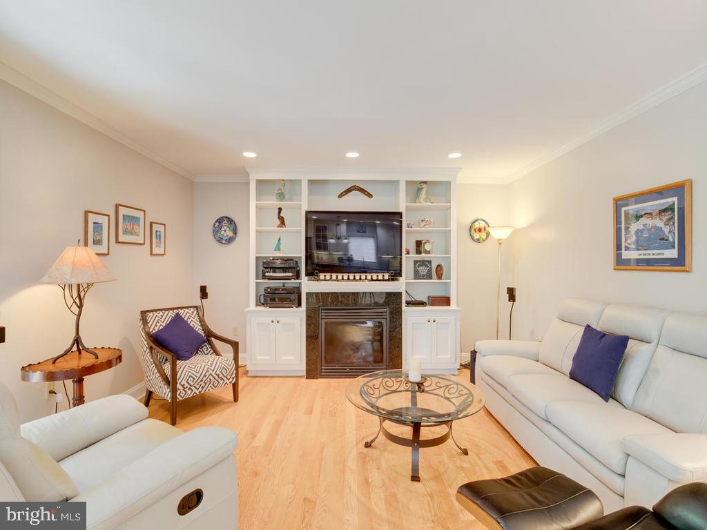 815 Dividing Road Severna Park, MD 21146 - Photo 24 of 74 Gas fireplace surrounded by built in shelves