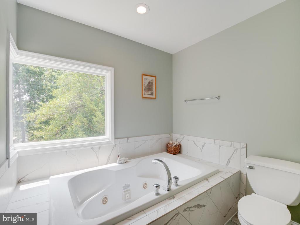 815 Dividing Road Severna Park, MD 21146 - Photo 41 of 74 Soaking tub and spa with water view