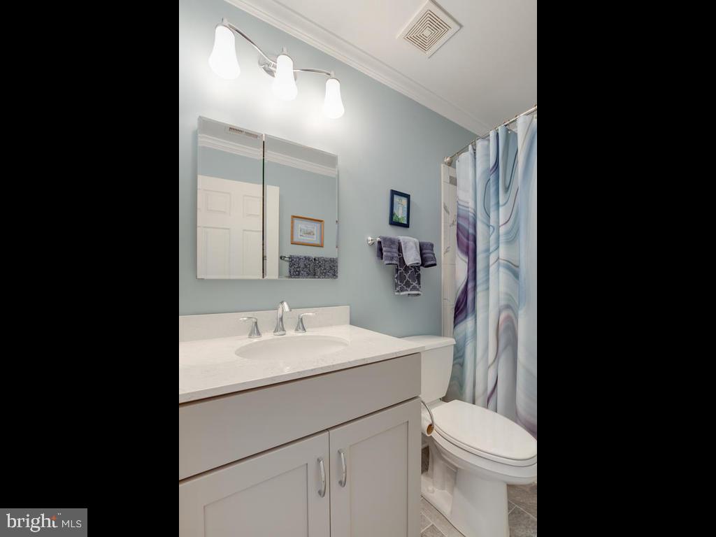 815 Dividing Road Severna Park, MD 21146 - Photo 51 of 74 Beautiful tile floor and bath tub.