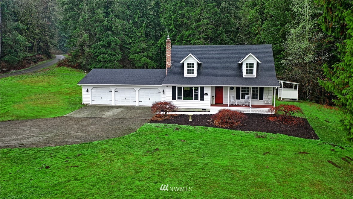 5918 Robe Menzel Road Snohomish, WA 98290 - Photo 2 of 40 a aerial view of a house with a yard and sitting area