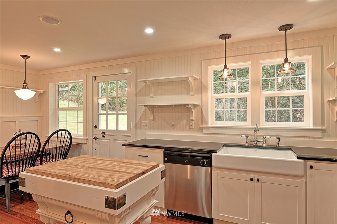 5918 Robe Menzel Road Snohomish, WA 98290 - Photo 15 of 40 a kitchen with a sink stove and cabinets