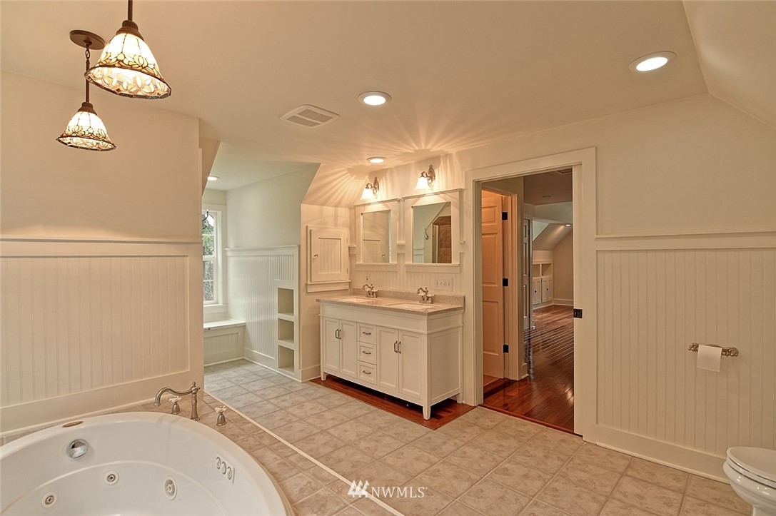5918 Robe Menzel Road Snohomish, WA 98290 - Photo 25 of 40 a bathroom with a sink a mirror and a shower