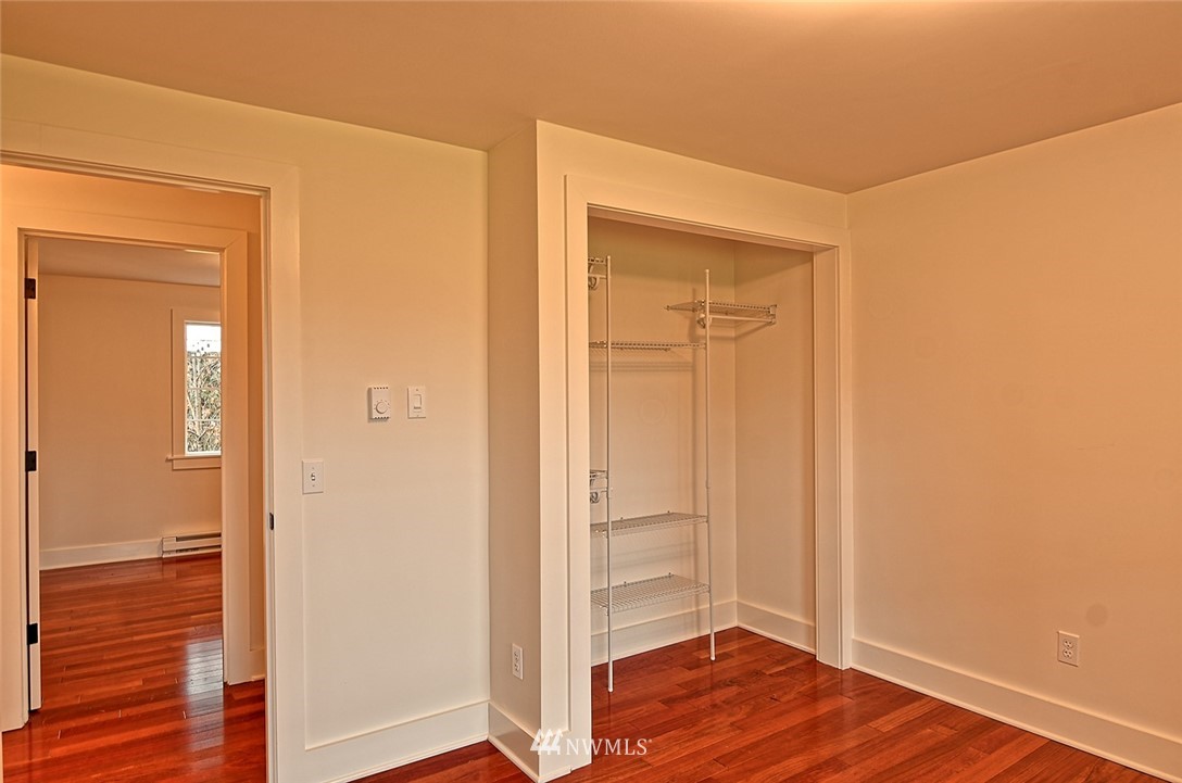 5918 Robe Menzel Road Snohomish, WA 98290 - Photo 33 of 40 a view of a hallway with wooden floor