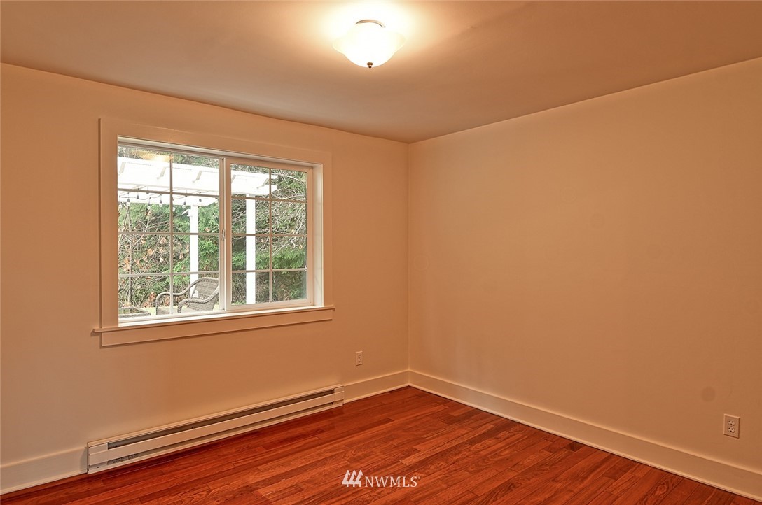 5918 Robe Menzel Road Snohomish, WA 98290 - Photo 34 of 40 a view of a room with wooden floor and a window