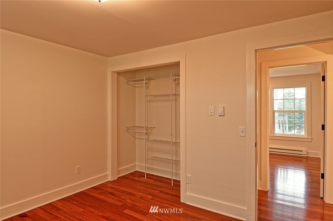 5918 Robe Menzel Road Snohomish, WA 98290 - Photo 36 of 40 a view of an empty room with wooden floor