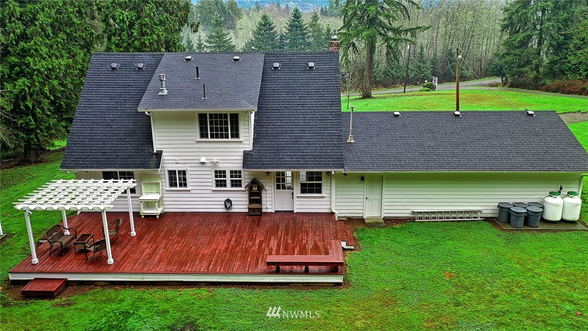 5918 Robe Menzel Road Snohomish, WA 98290 - Photo 5 of 40 an aerial view of a house with a garden and trees