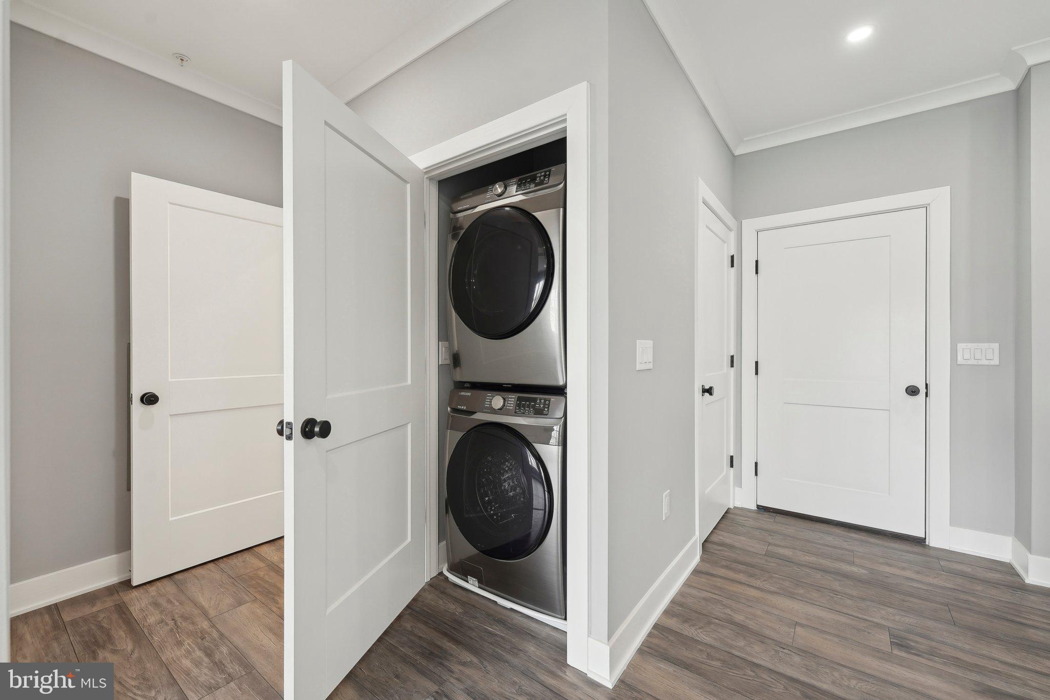 2421 Bristol Road, Unit 310 Warrington, PA 18976 - Photo 16 of 19 a view of a hallway with washer and dryer
