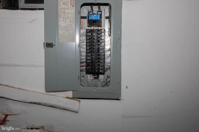 a city street lined with buildings and cars