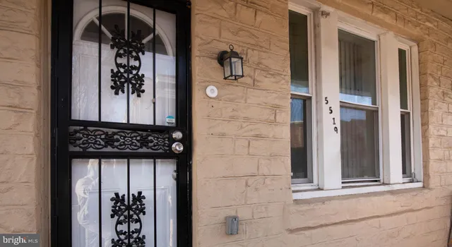 a view of a door and a window