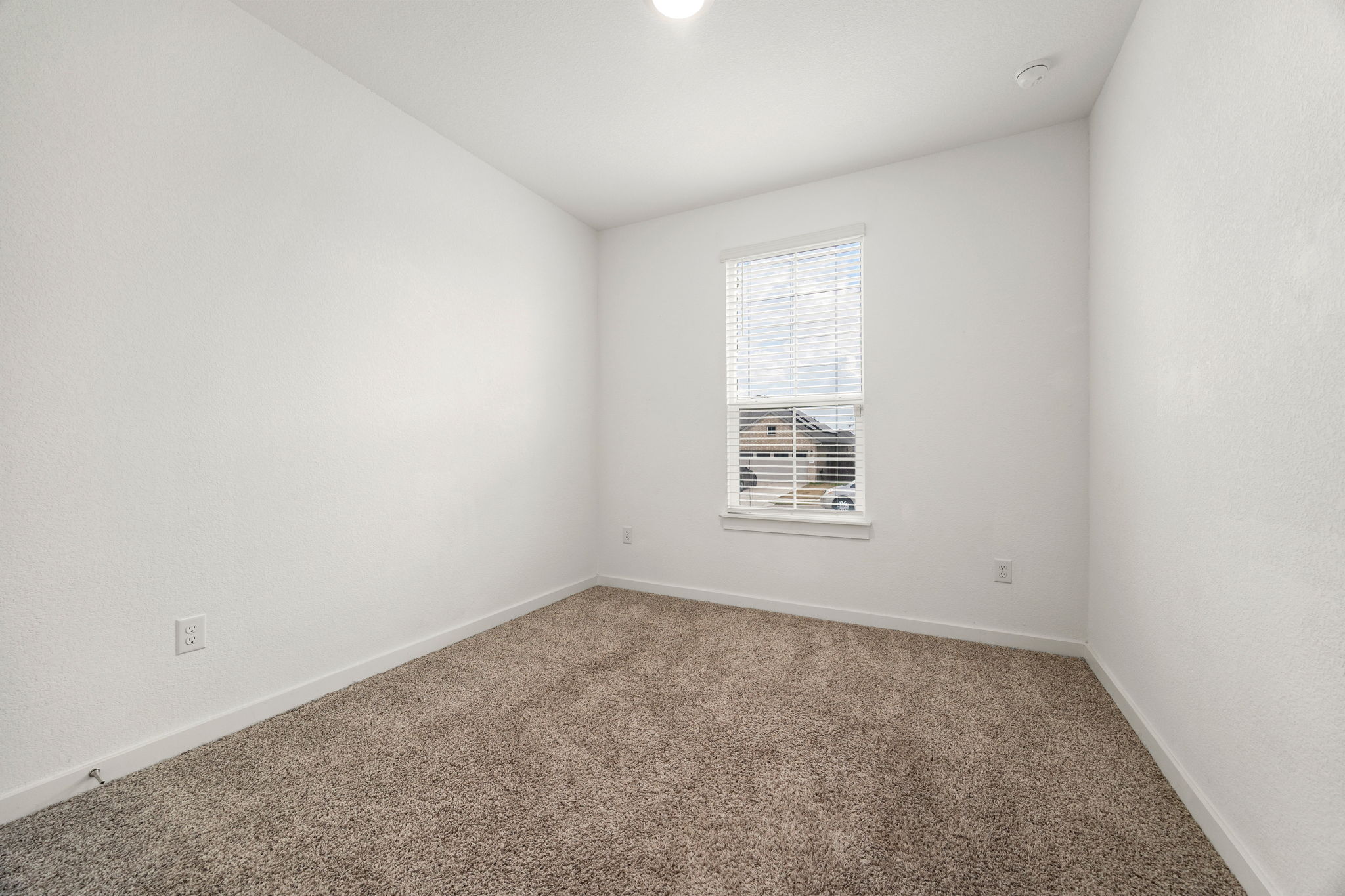904 Balsora Cove Georgetown, TX 78628 - Photo 27 of 40 Carpeted #1 guest bedroom featuring baseboards