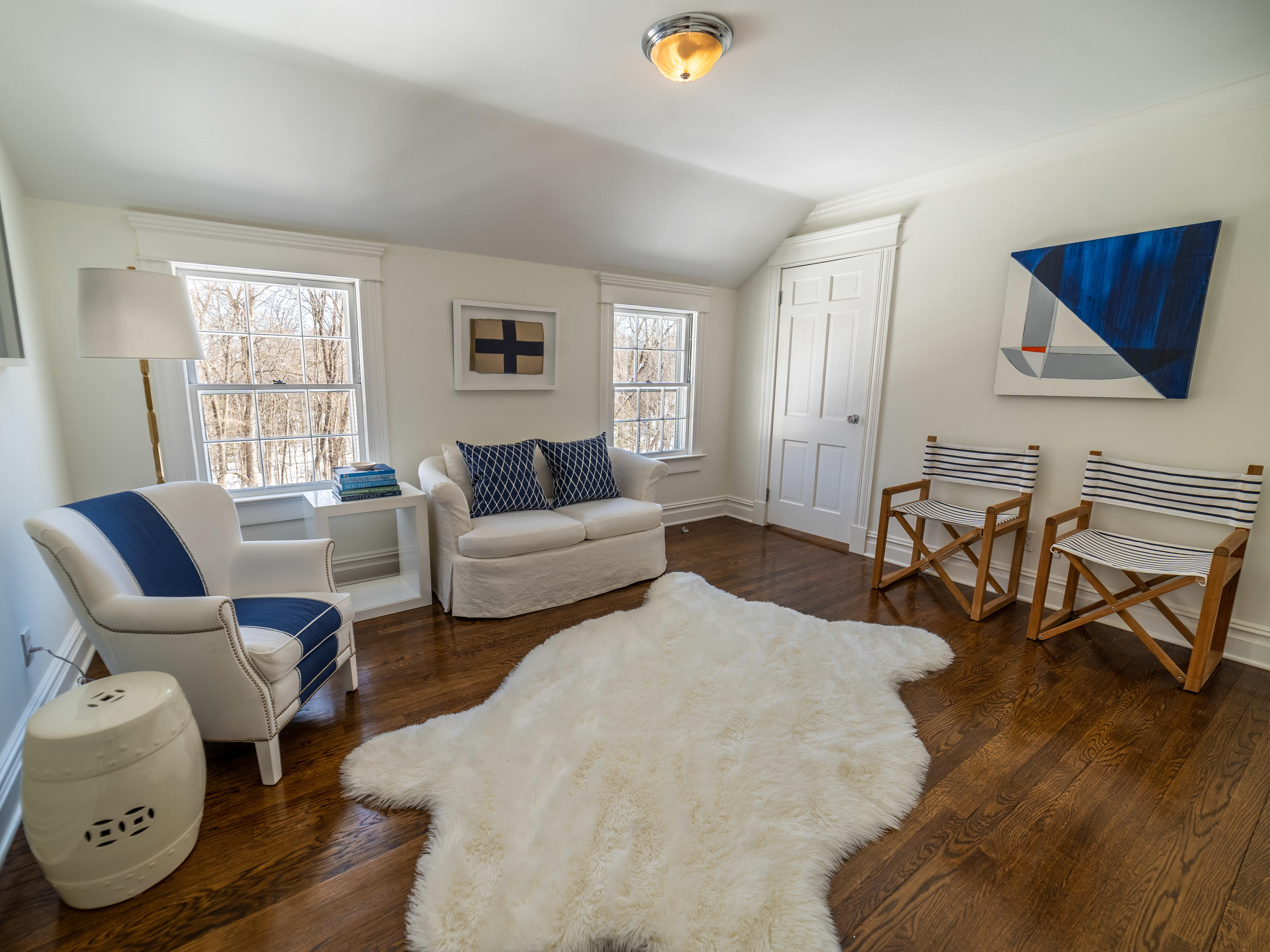 103 Salem Road New Canaan, CT 06840 - Photo 24 of 42 a living room with furniture and wooden floor