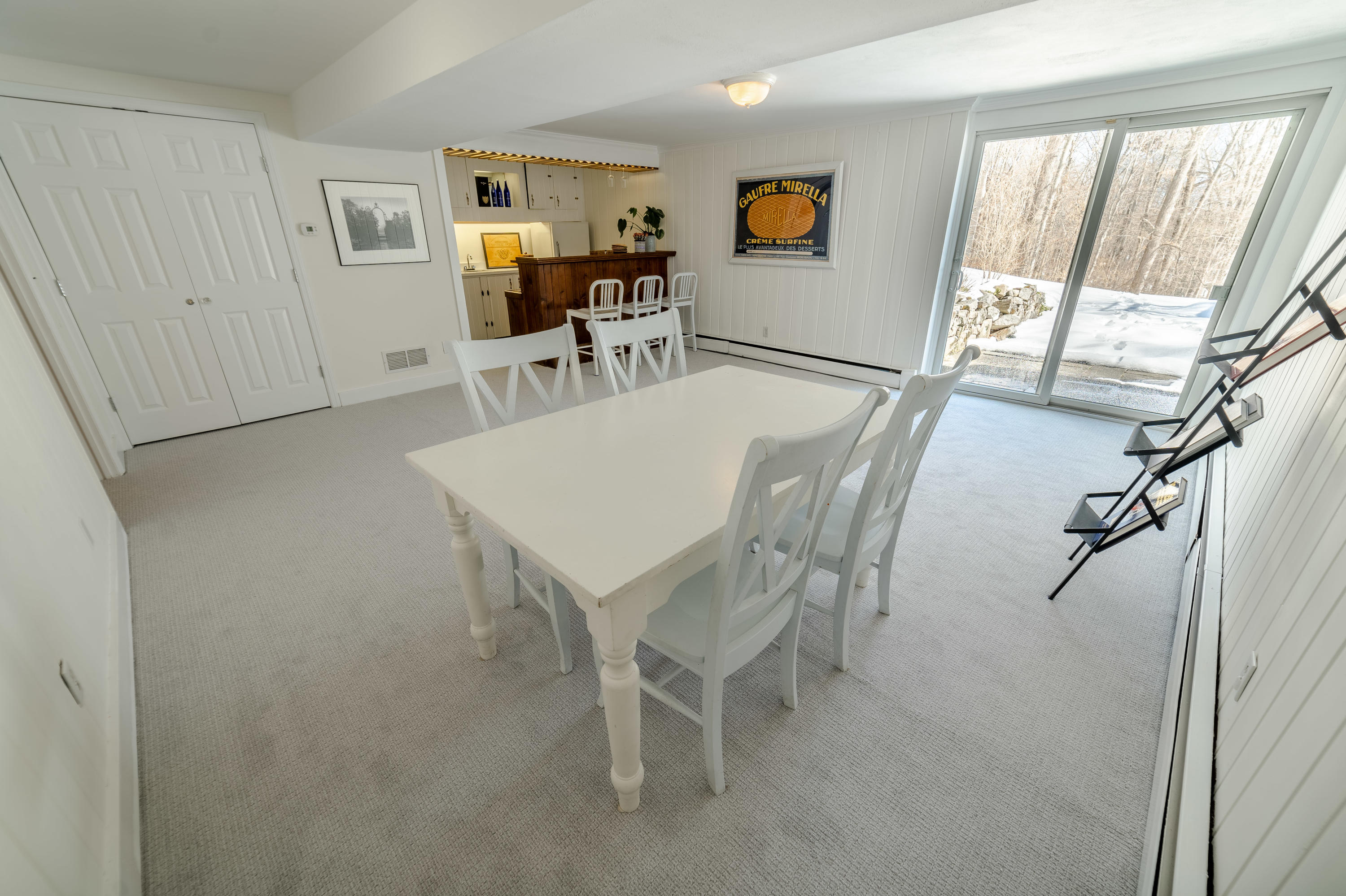 103 Salem Road New Canaan, CT 06840 - Photo 27 of 42 a view of a dining room with furniture and a window