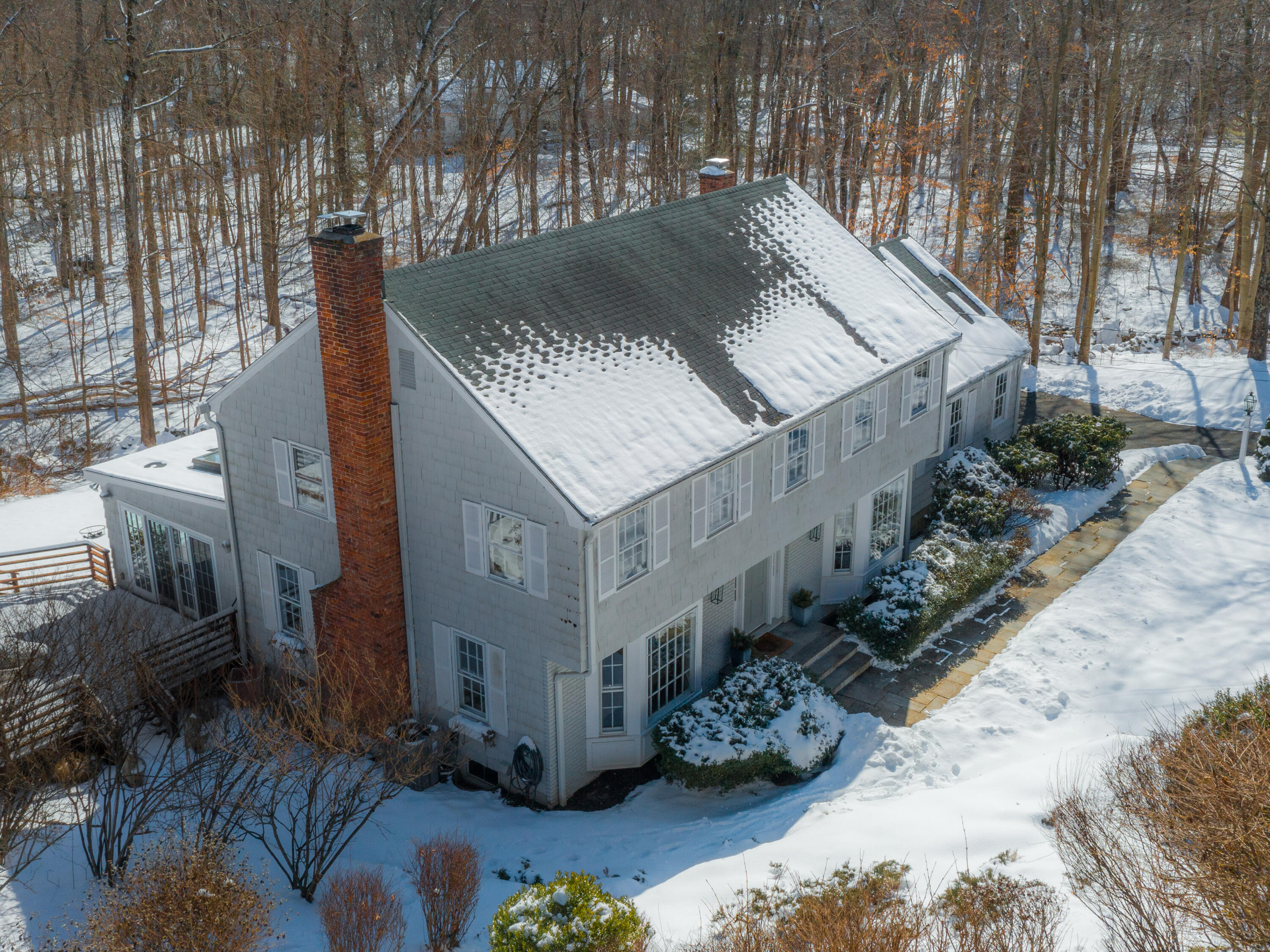 103 Salem Road New Canaan, CT 06840 - Photo 30 of 42 a view of a house with a yard