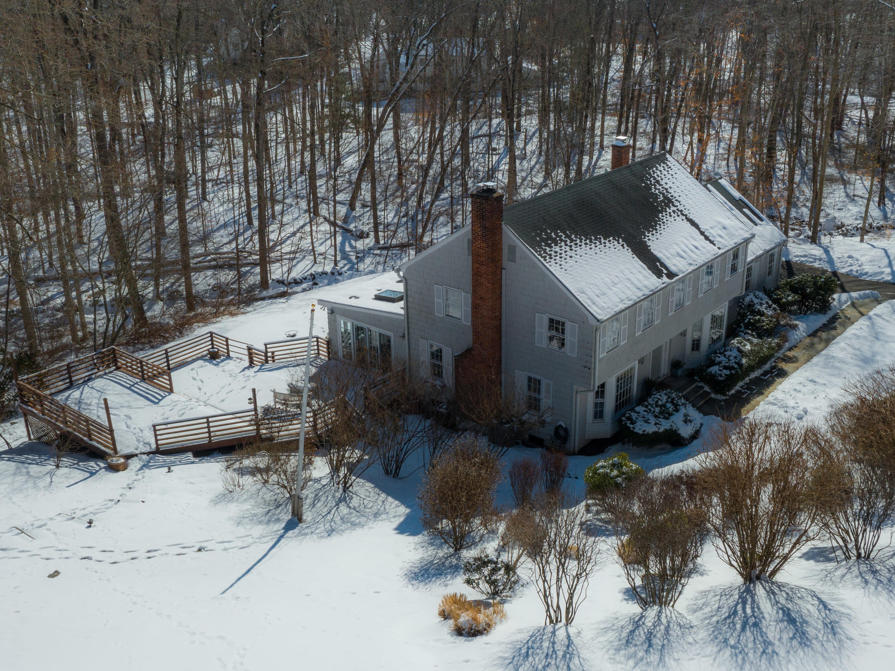 103 Salem Road New Canaan, CT 06840 - Photo 31 of 42 a view of a house with a yard and sitting area