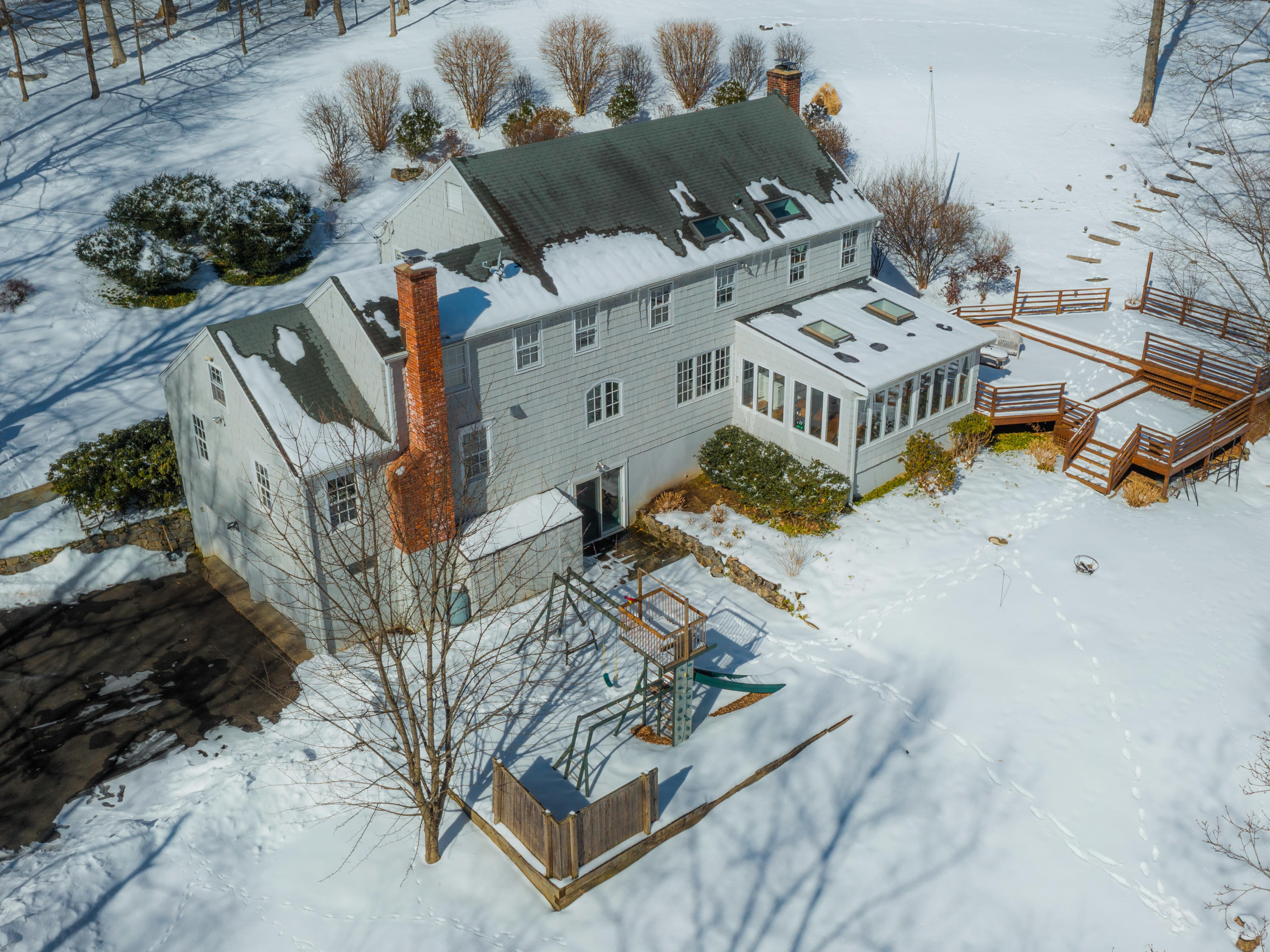 103 Salem Road New Canaan, CT 06840 - Photo 32 of 42 an aerial view of residential houses with outdoor space